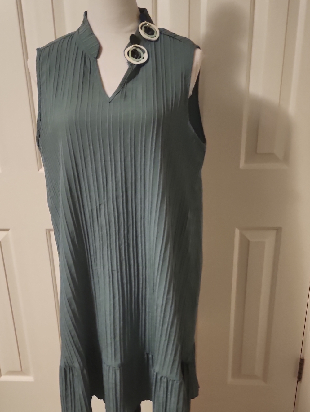 Sleeveless Pleated Shift Dress in Teal with Accent Earrings